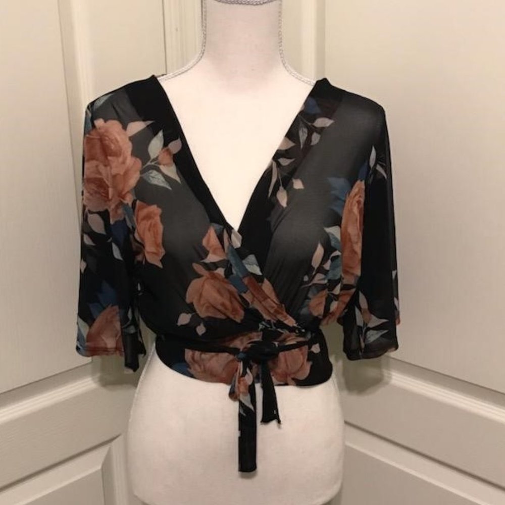Sheer crop wrap around top with a peek a boo back !!